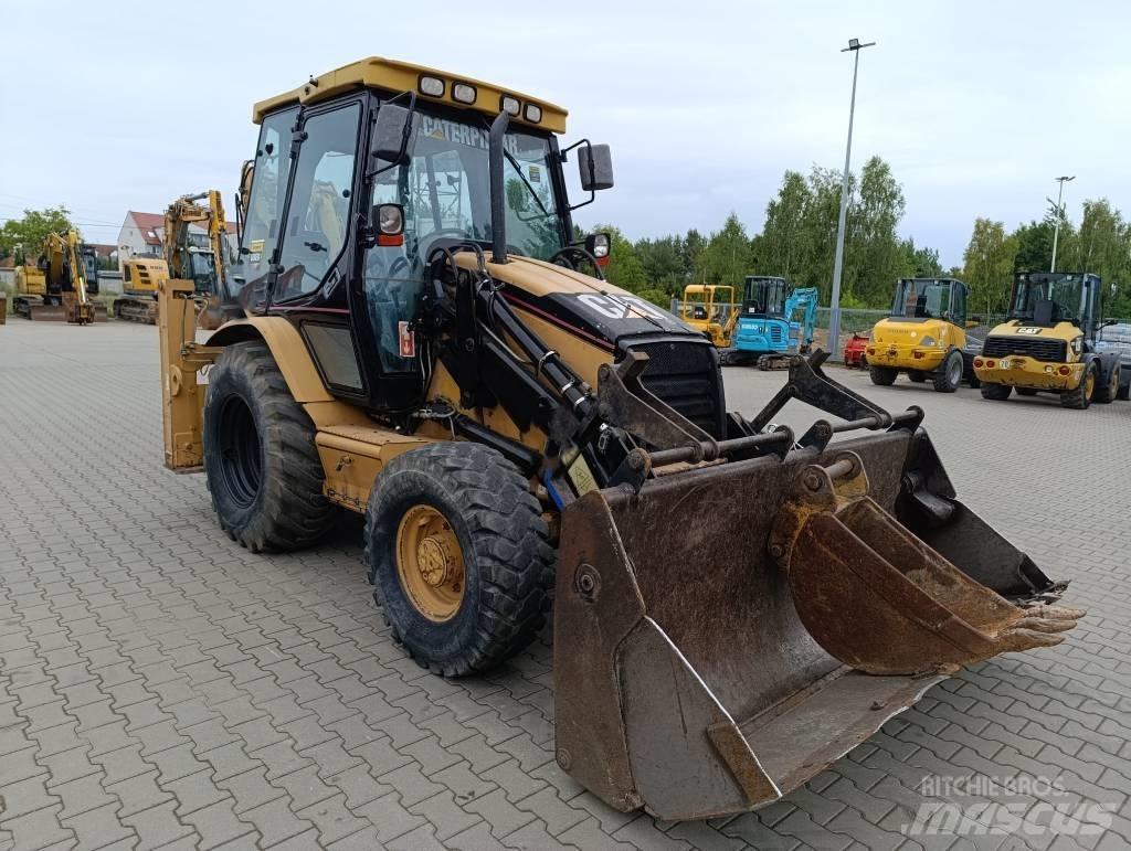 CAT 428 D لوادر ذات جرافات عكسية