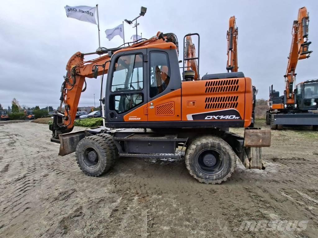 Doosan DX140W-5 حفارات بعجل
