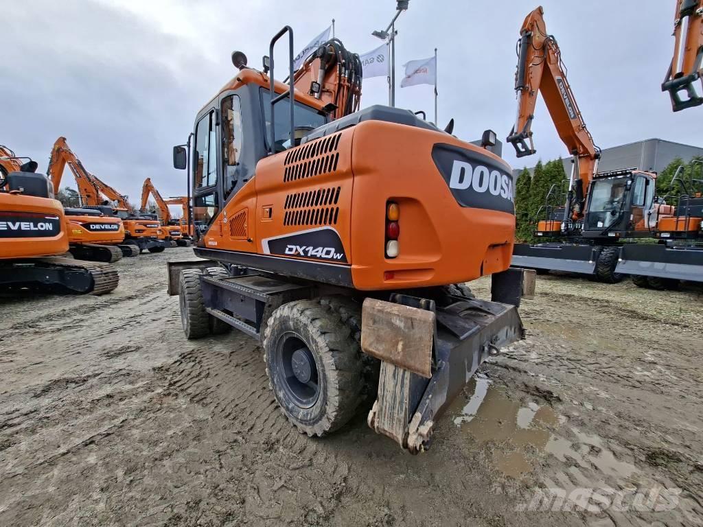 Doosan DX140W-5 حفارات بعجل