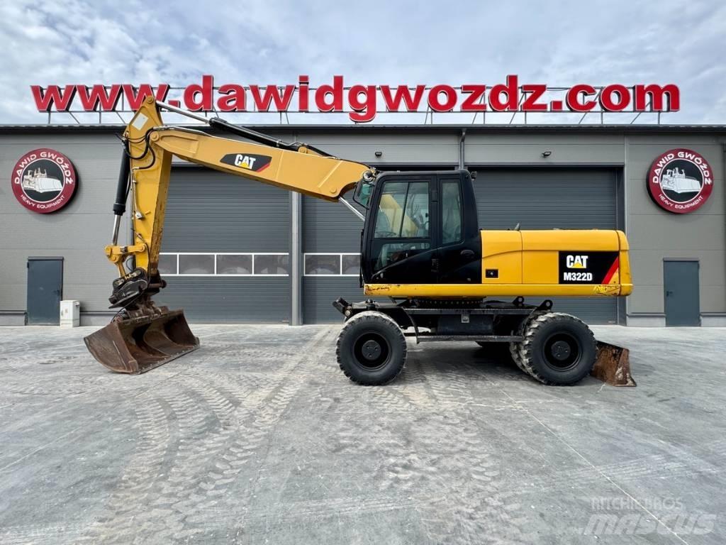 CAT M322D حفارات بعجل