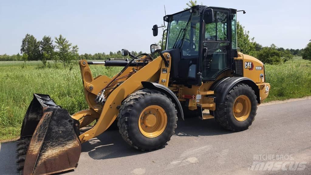 CAT 908M لوادر بعجل