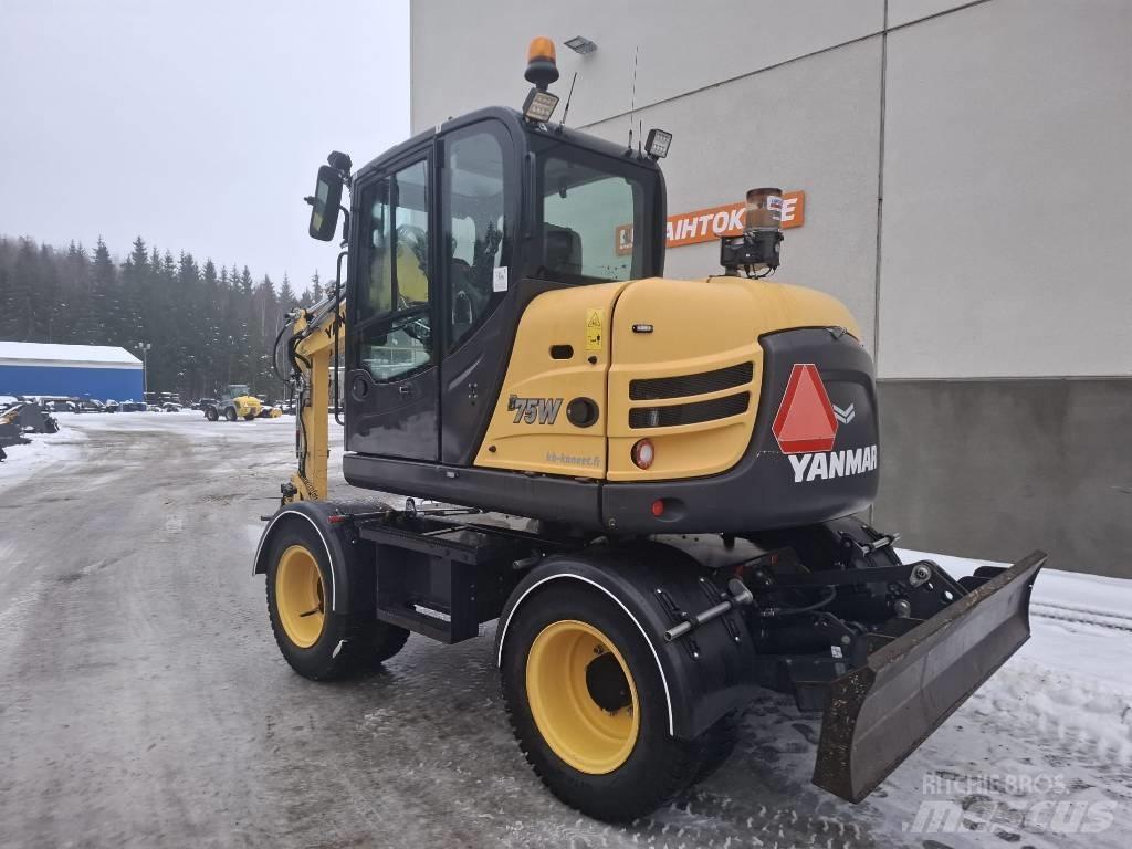 Yanmar B 75 W حفارات بعجل