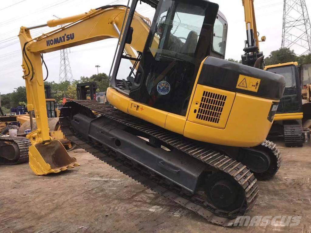 Komatsu PC 128 US حفارات وسط 7 طن - 12 طن