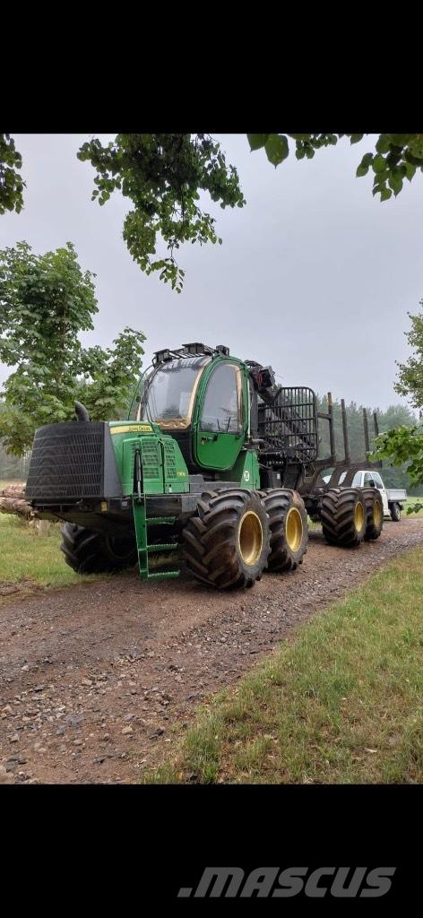 John Deere 1110E شاحنات