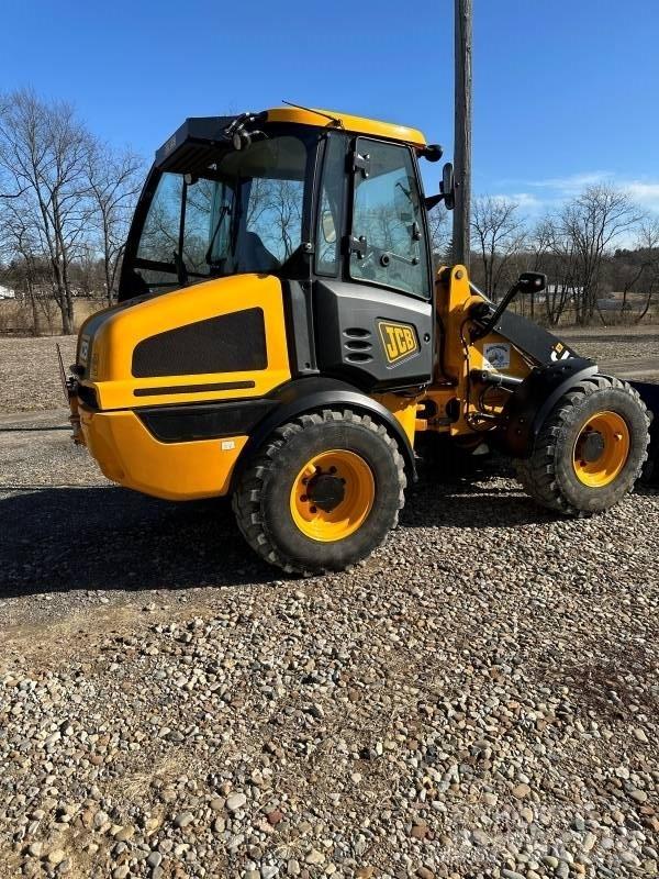 JCB 409 لوادر بعجل