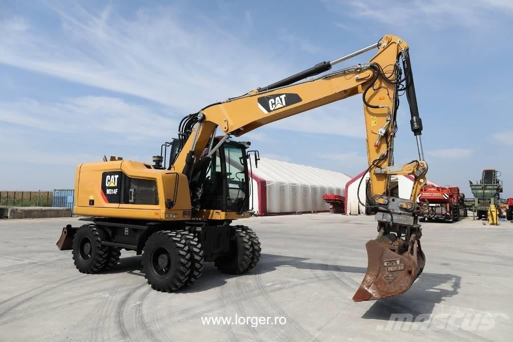 CAT M 314 F حفارات بعجل