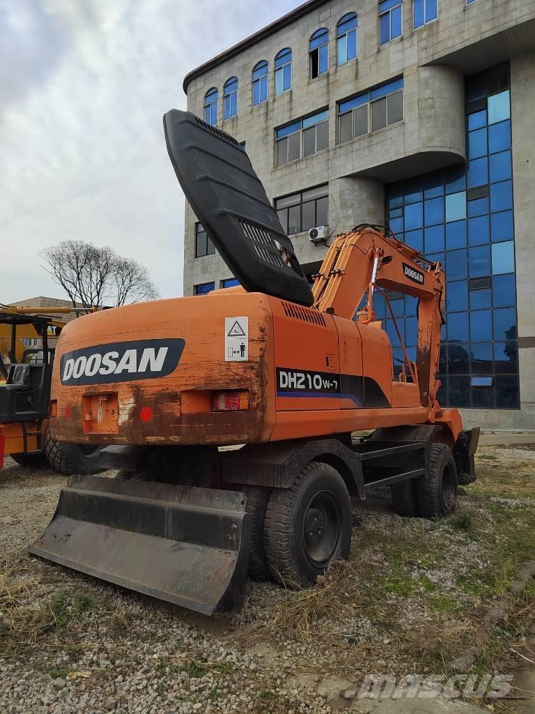 Doosan DH 210 W-7 حفارات بعجل