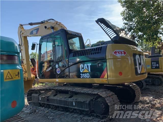 CAT 318DL حفارات زحافة