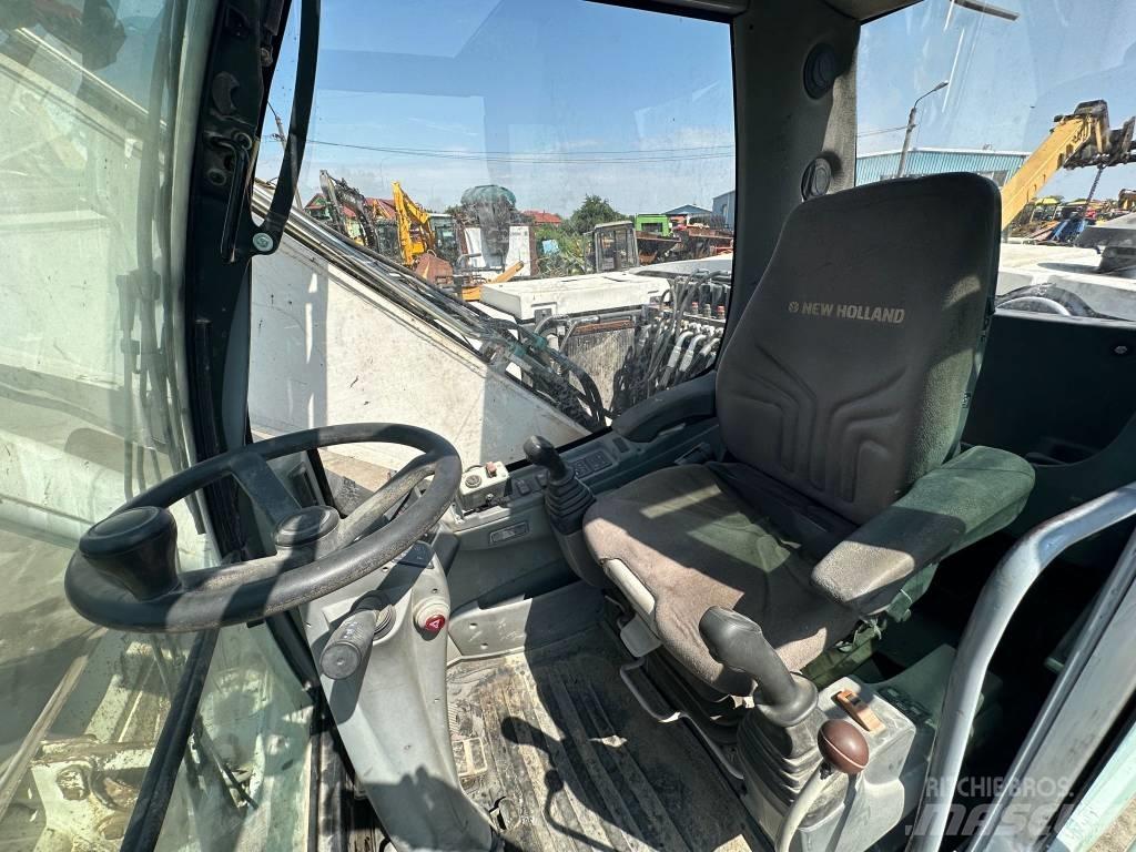 New Holland MH Plus حفارات بعجل