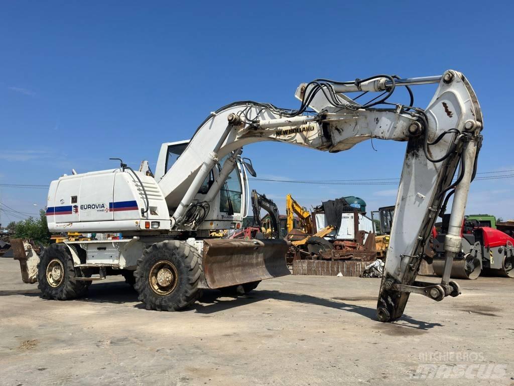New Holland MH Plus حفارات بعجل