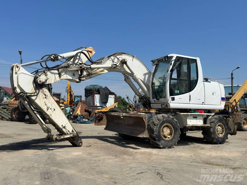 New Holland MH Plus حفارات بعجل