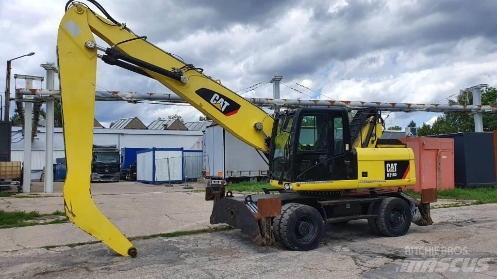 CAT M 318 D MH مناولات المخلفات / مناولات صناعية