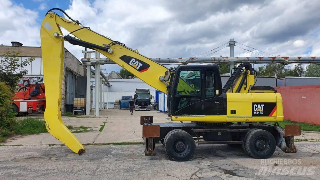 CAT M 318 D MH مناولات المخلفات / مناولات صناعية