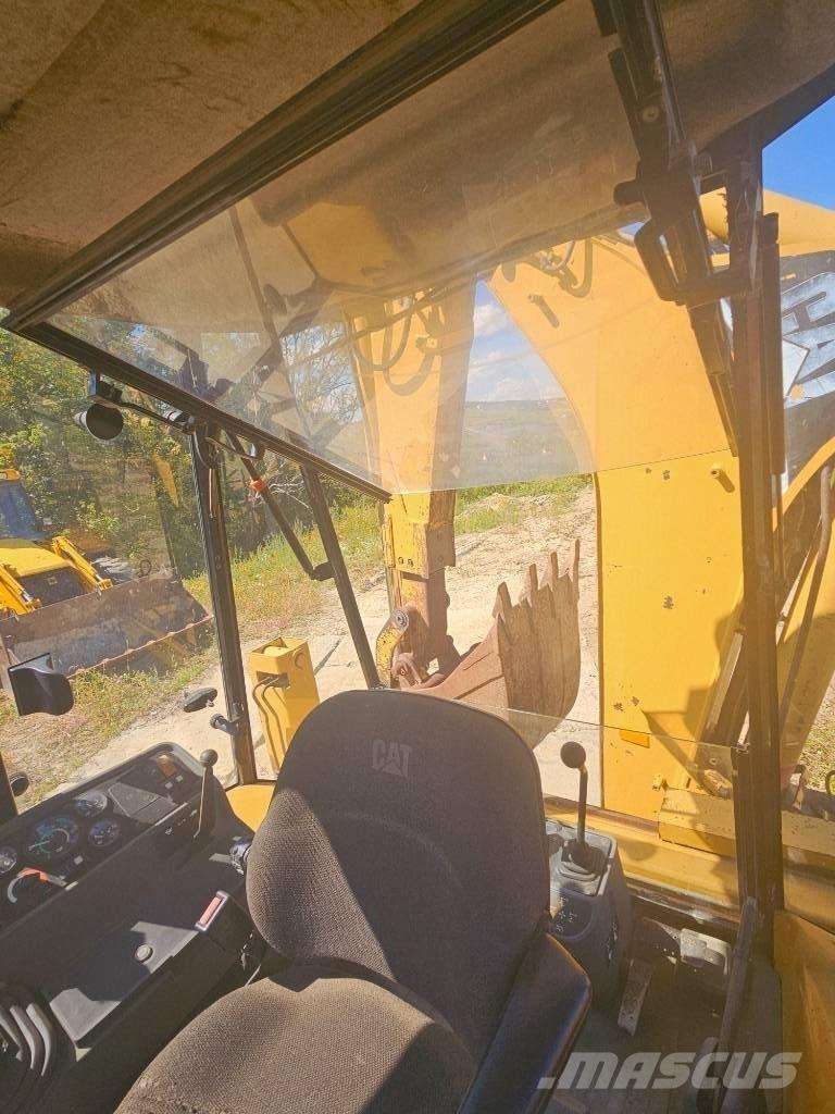 CAT 428 C لوادر ذات جرافات عكسية