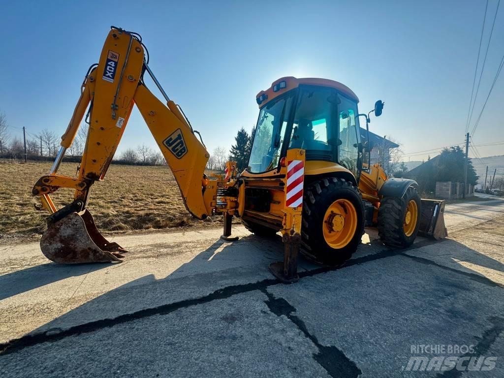 JCB 4 CX لوادر ذات جرافات عكسية