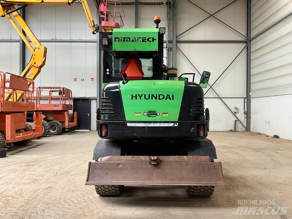 Hyundai 55 W-7 A حفارات بعجل
