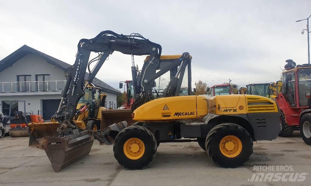 Mecalac 12 M TX حفارات بعجل