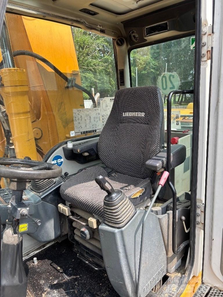 Liebherr A316 حفارات بعجل