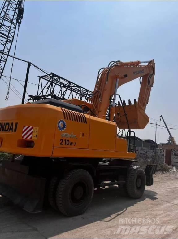 Hyundai 210W-7 حفارات بعجل