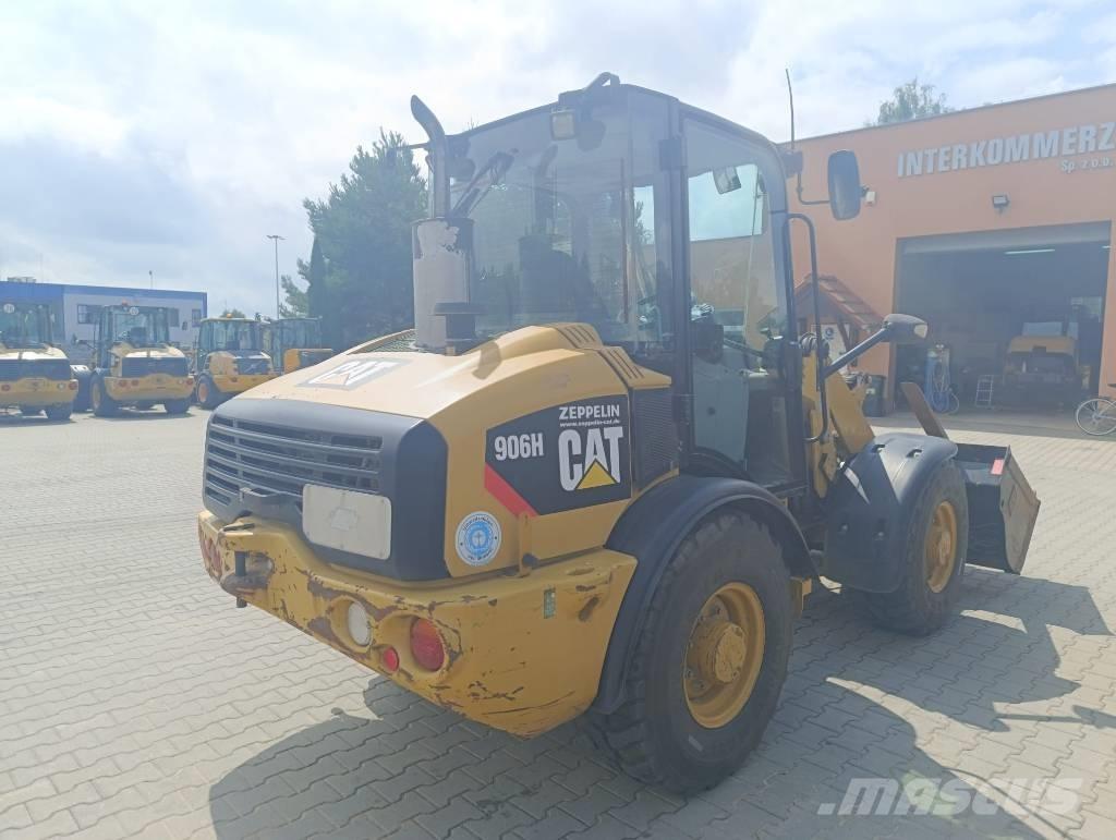 CAT 906 H لوادر بعجل