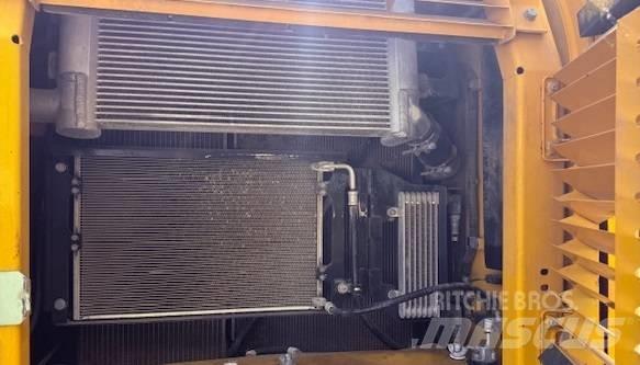 Komatsu PW 180-10 حفارات بعجل
