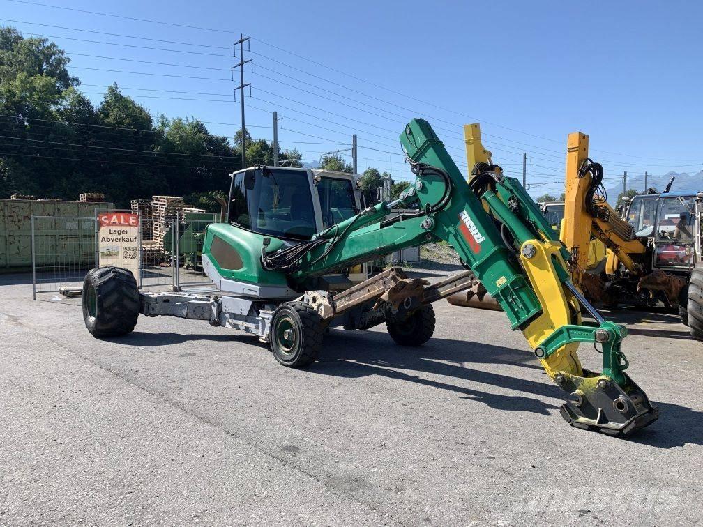 Menzi Muck M325 حفارات بعجل
