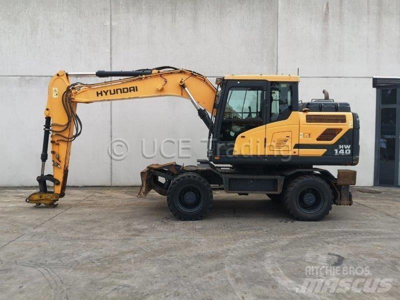 Hyundai HW140 حفارات بعجل