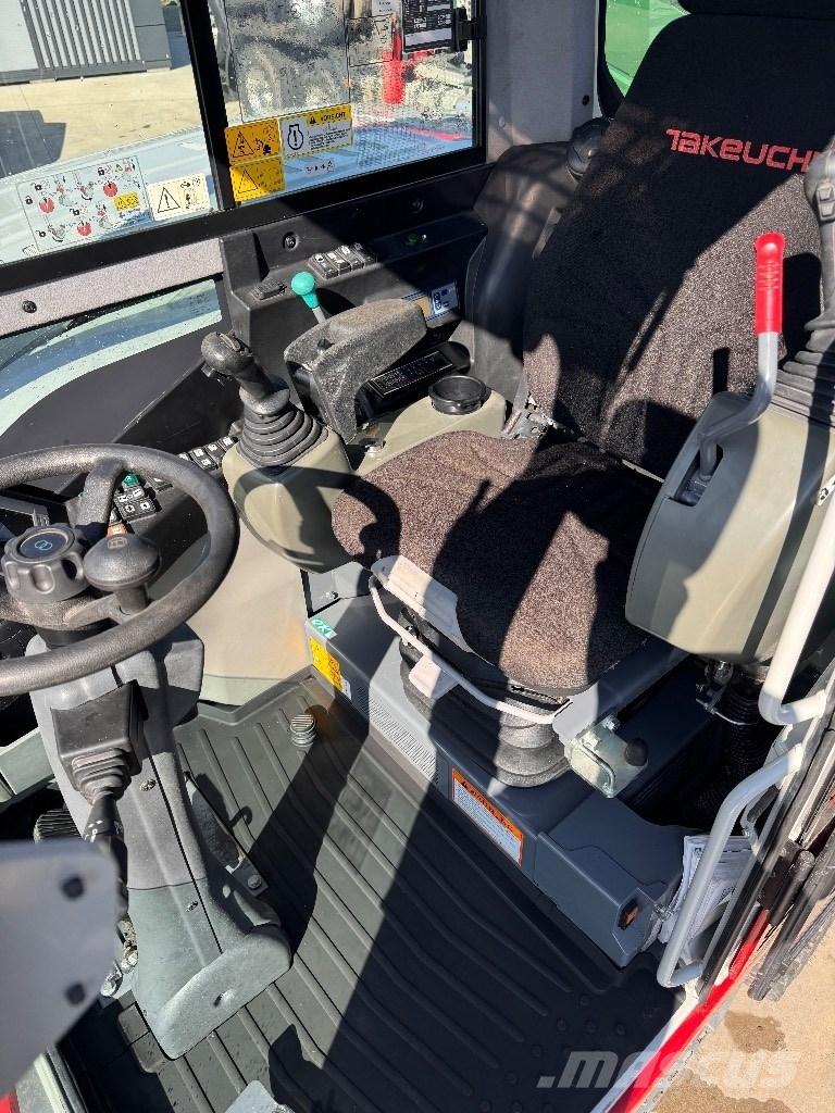 Takeuchi TB 295 W حفارات بعجل