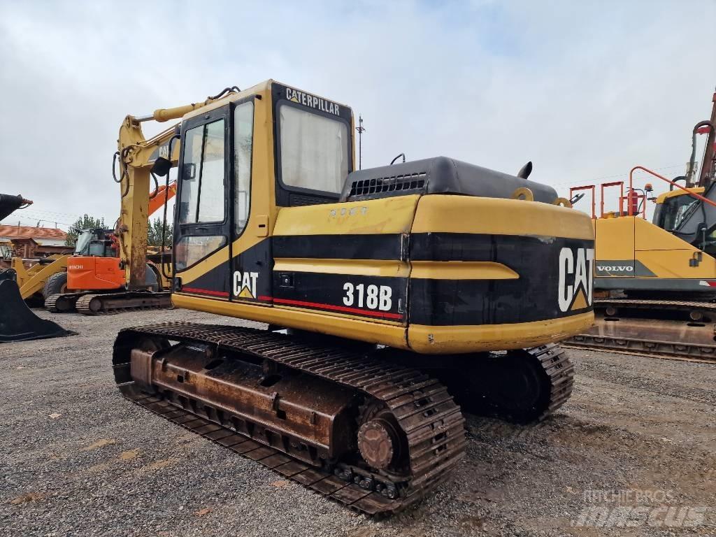 CAT 318 B L حفارات زحافة