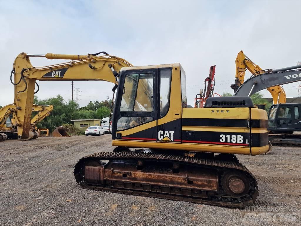 CAT 318 B L حفارات زحافة