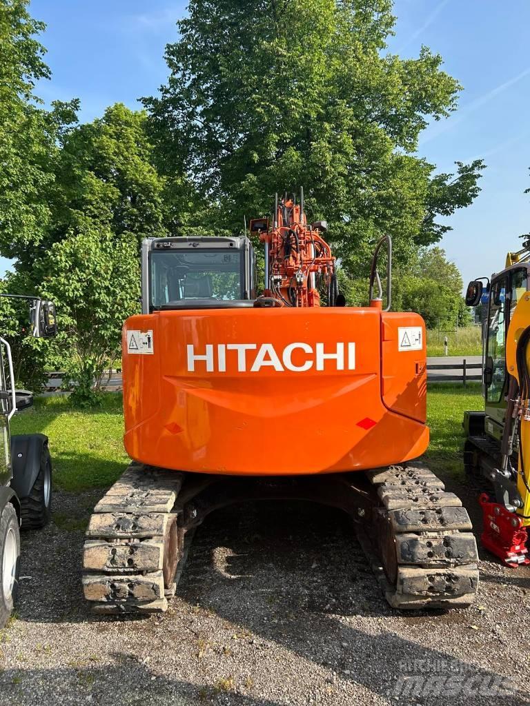 Hitachi ZX 135 US-3 حفارات زحافة