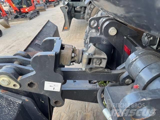 Yanmar B 110 W حفارات بعجل