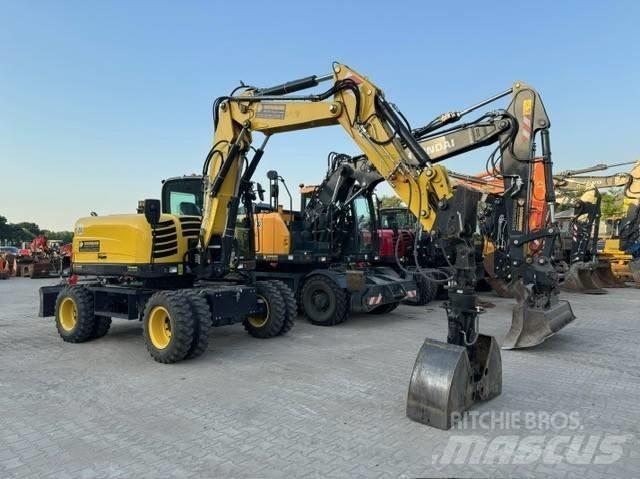 Yanmar B 110 W حفارات بعجل