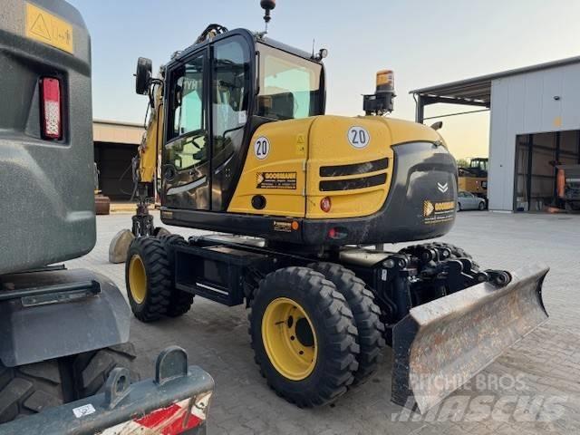Yanmar B 110 W حفارات بعجل