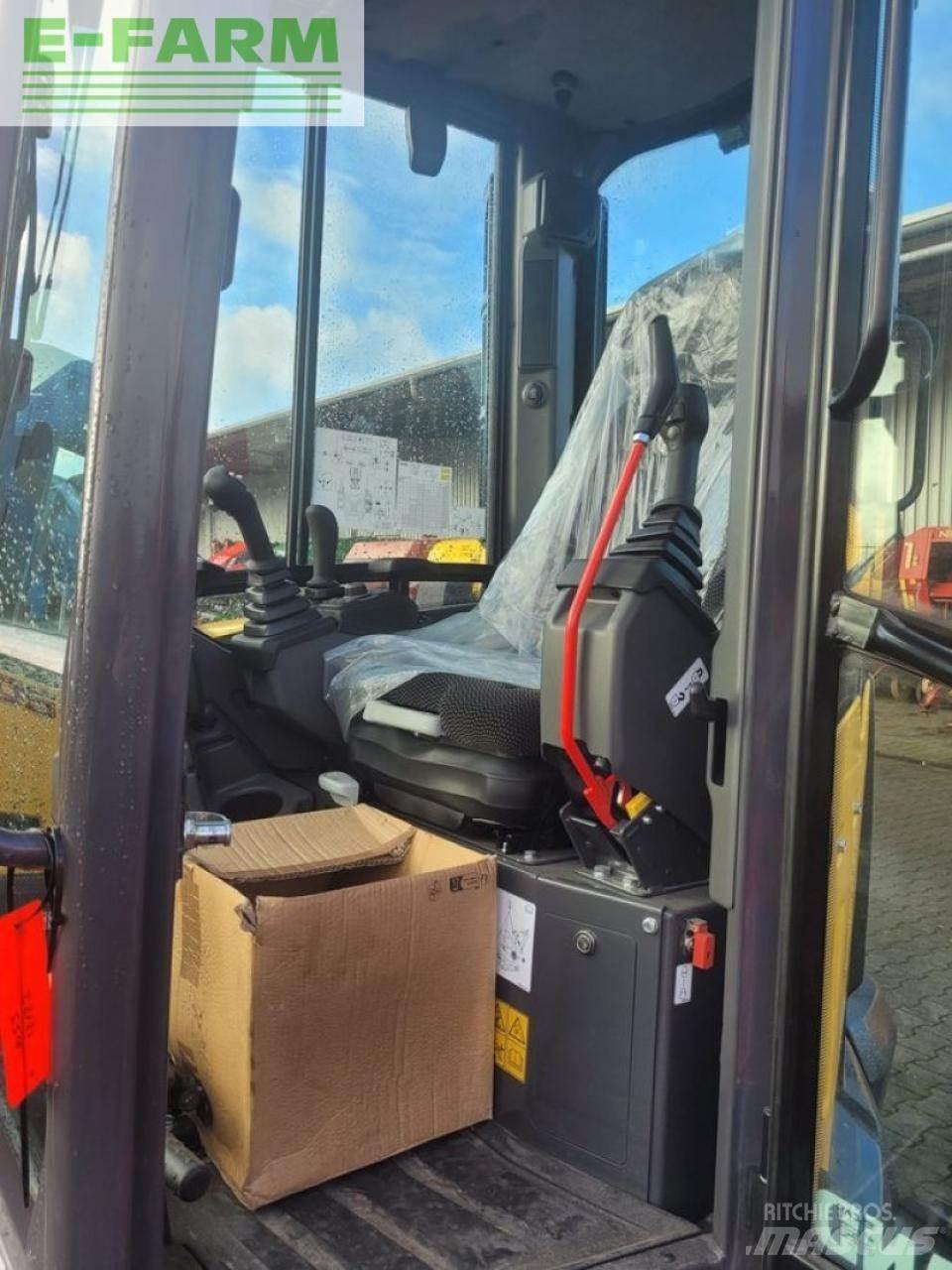 New Holland e55d حفارات بعجل