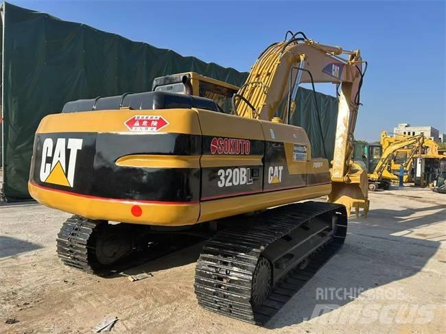 CAT 320 B حفارات زحافة