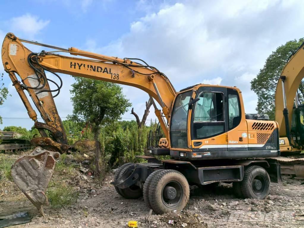 Hyundai R150W-9 حفارات بعجل