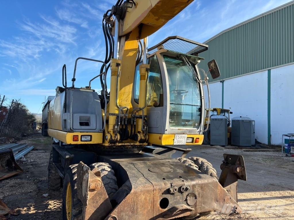 New Holland MH 6.6 حفارات بعجل