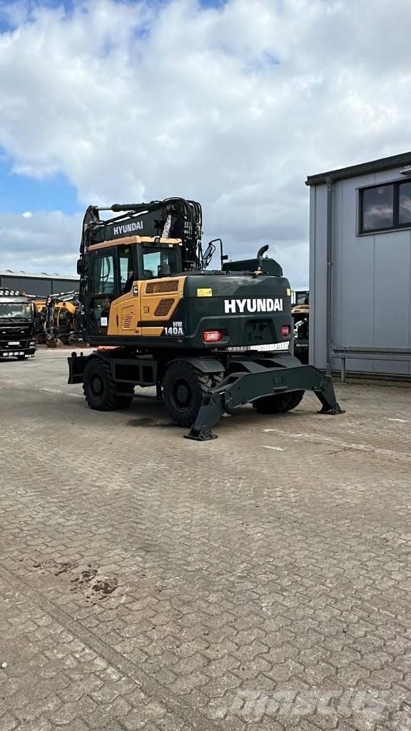 Hyundai HW 140 A حفارات بعجل