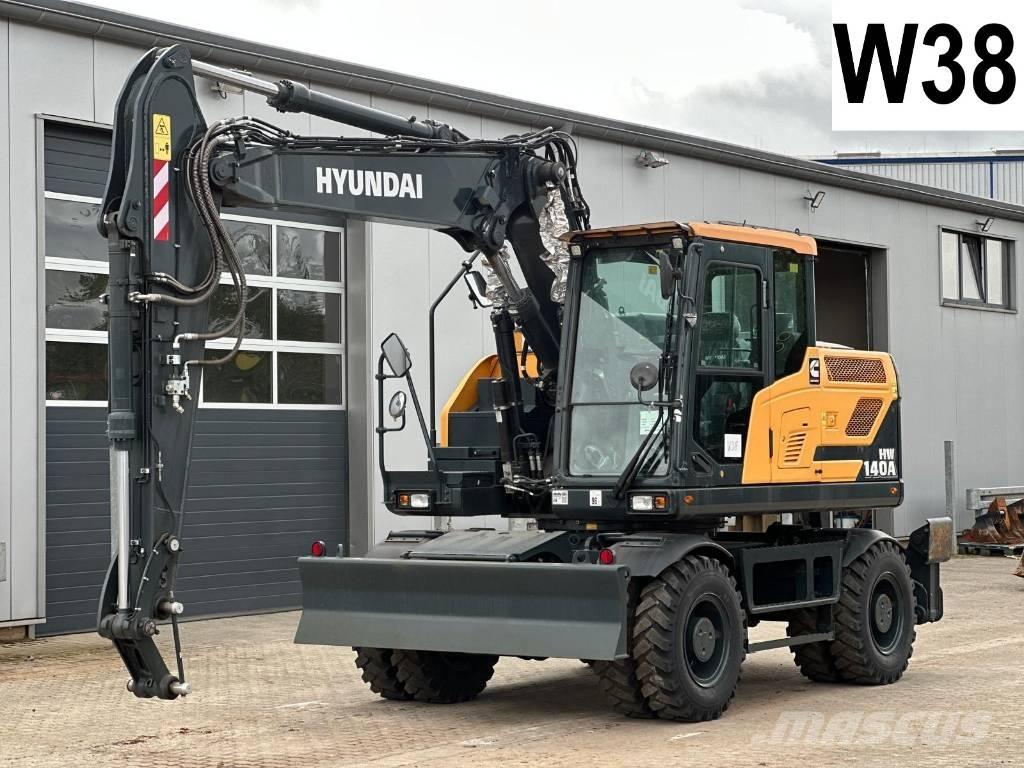 Hyundai HW 140 A حفارات بعجل