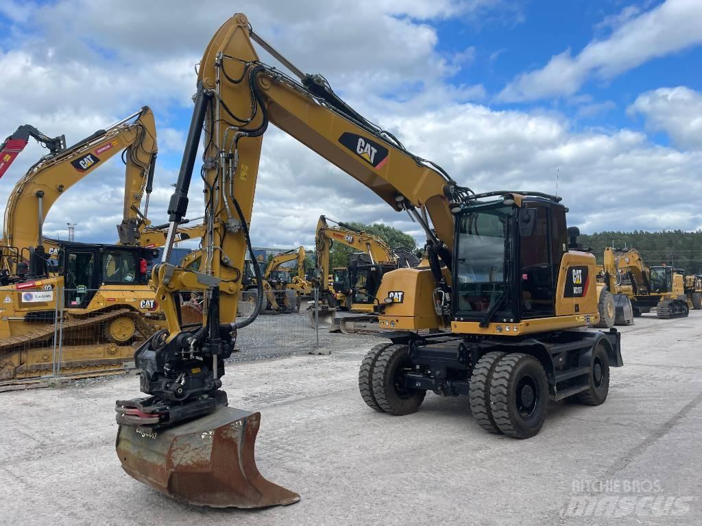 CAT M317F حفارات بعجل