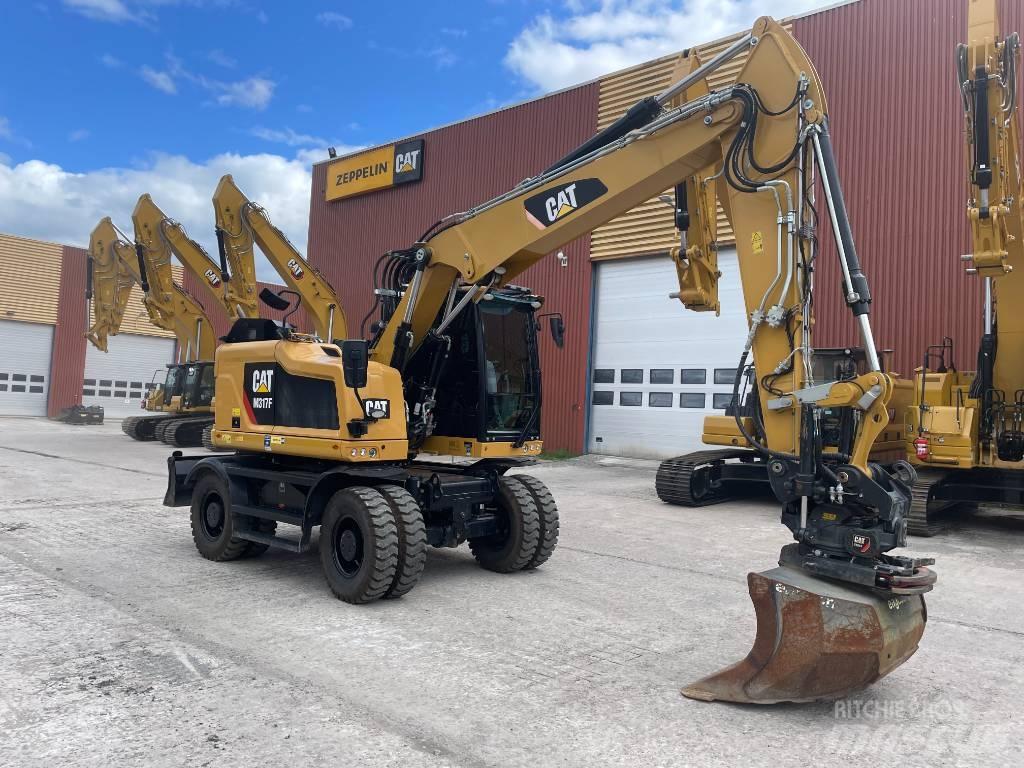 CAT M317F حفارات بعجل