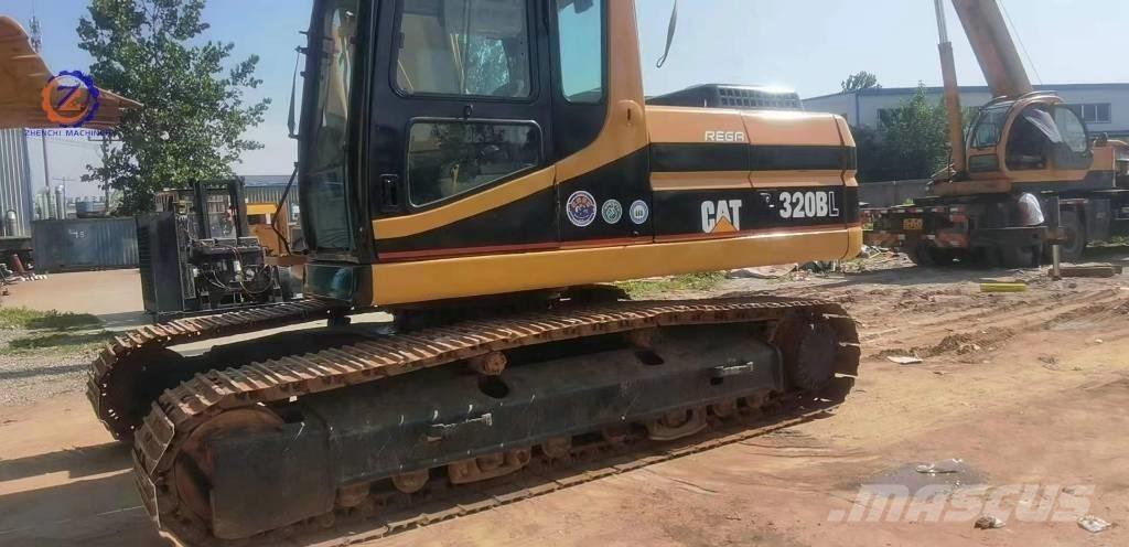 CAT 320 B L حفارات زحافة