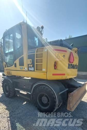 Komatsu PW148-8 حفارات بعجل