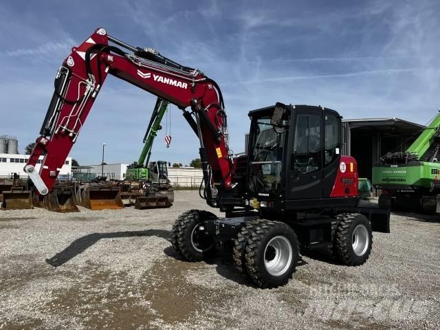 Yanmar B 95W حفارات بعجل