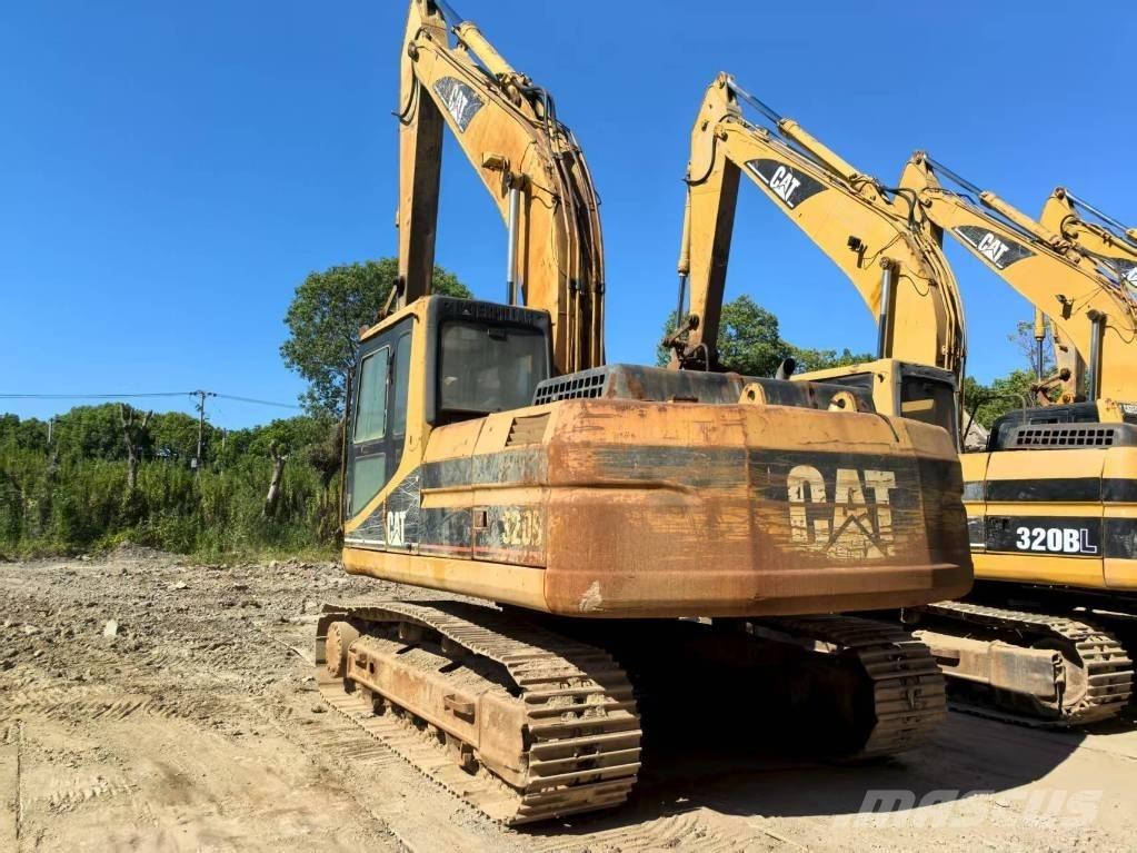 CAT 320 B L حفارات زحافة