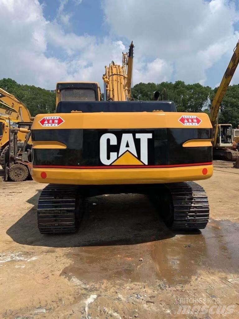 CAT 320 B حفارات زحافة