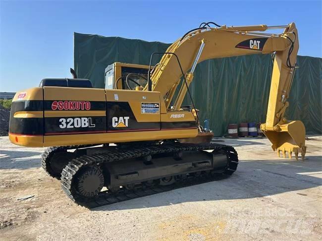 CAT 320 B حفارات زحافة