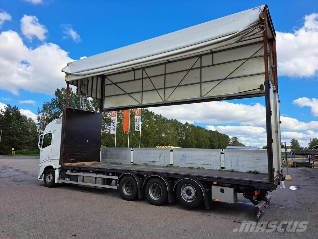 Volvo FH شاحنات مسطحة/مفصلية الجوانب
