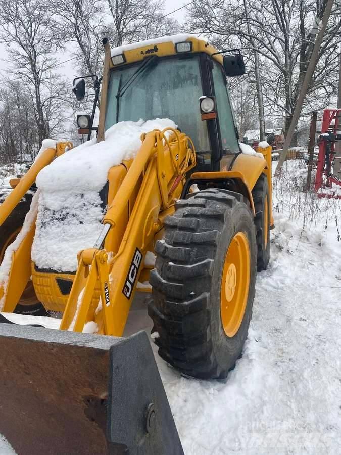 JCB 4 CX لوادر ذات جرافات عكسية